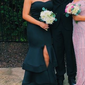 Black strapless ruffled dress with slit